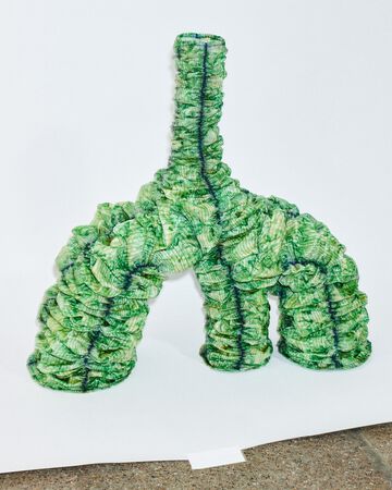 Future Talent Fabrics by Jonas Edvard: An abstract, upright sculptural installation crafted from textured bright green organic material