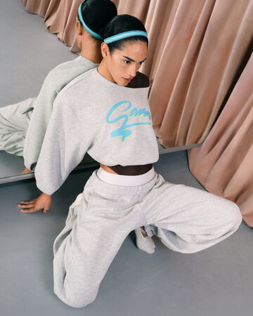 Model wearing GANNI x Lululemon tracksuit