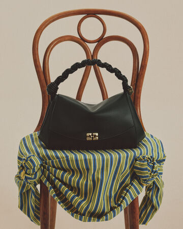 Very Bou Bag in black on chair