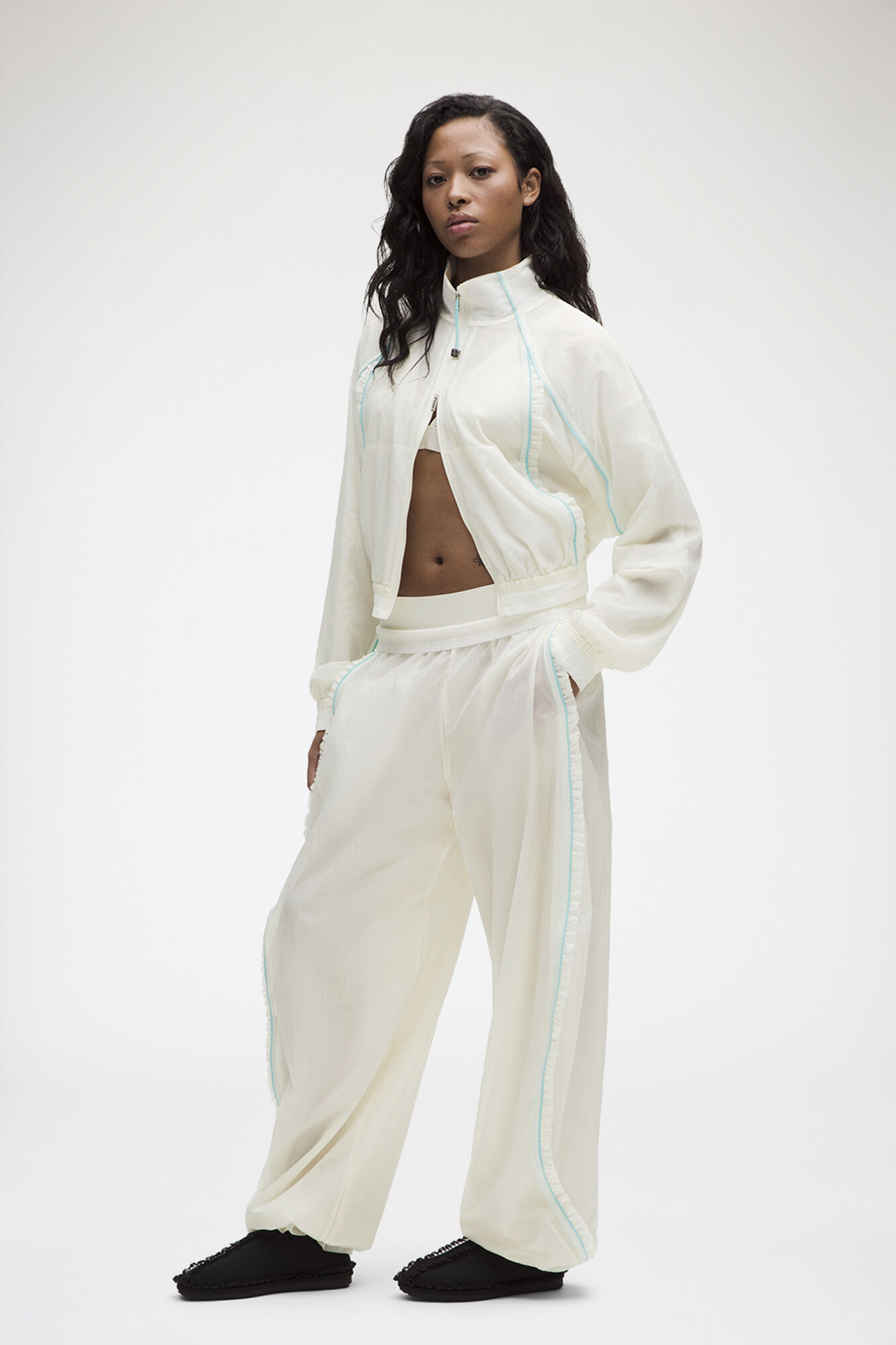 Ruffle-Trim Textured MR Pants, Recycled Polyamide, in colour Coconut Ivory - 1 - GANNI