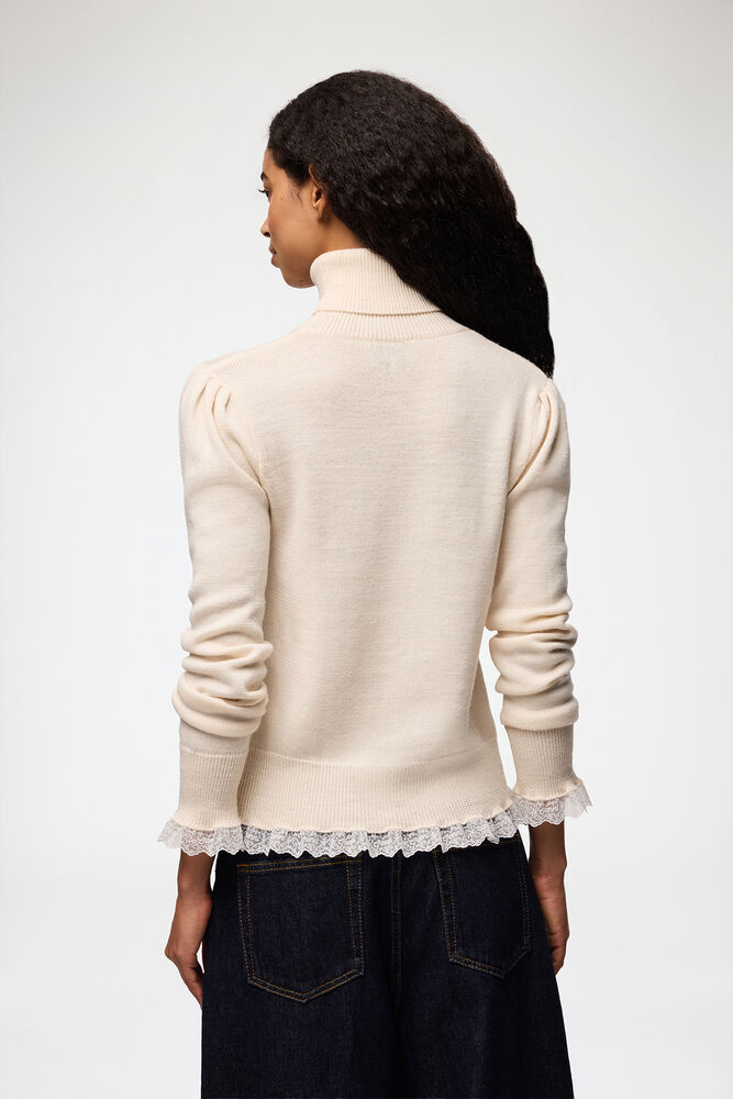 Rollkragenpullover aus Spitzenmerinowolle, Egret